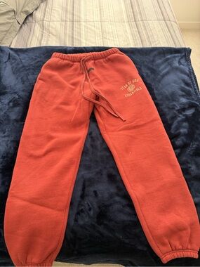 Essentials Kids Coral Red Sweatpants with Logo